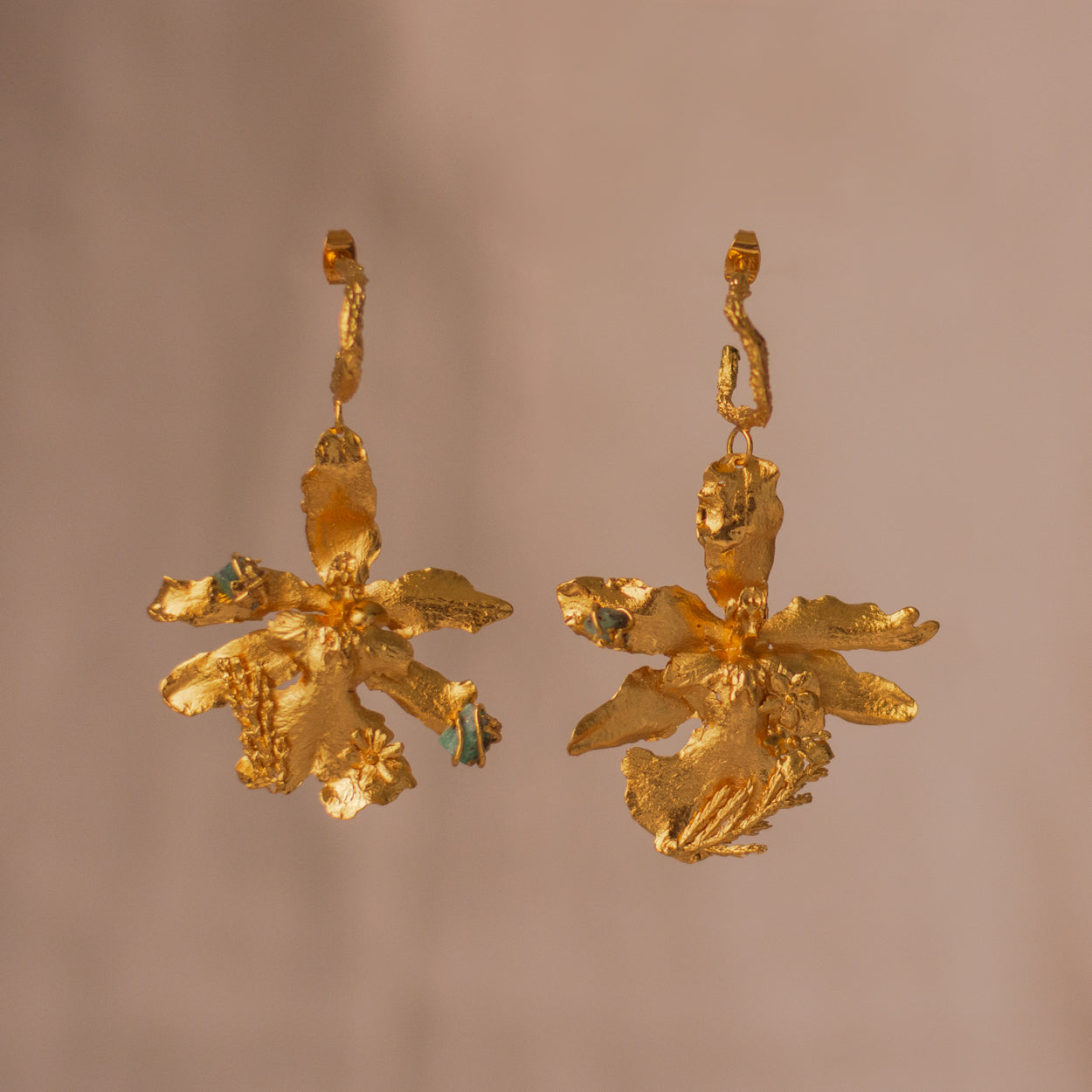 Odontoglossum Orchid & Pine Hoop Earrings, adorned with preserved flowers and emerald accents.