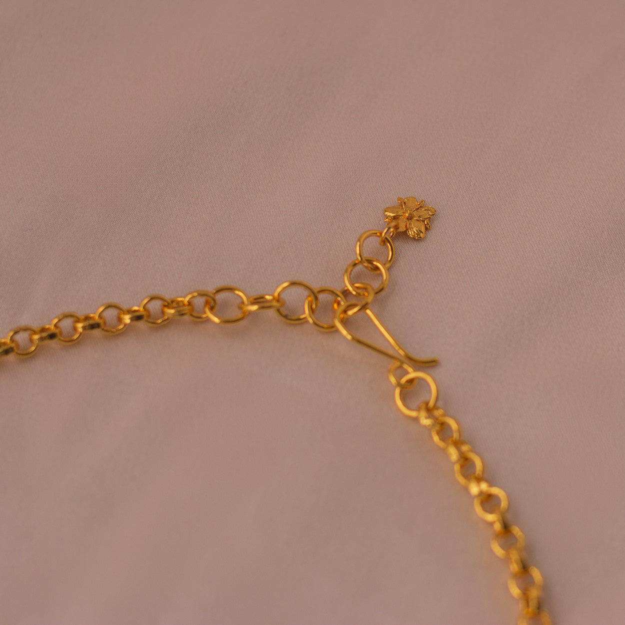 Close-up of Large Hydrangea Necklace, showcasing the intricate design of the hydrangea flowers in bronze and gold.