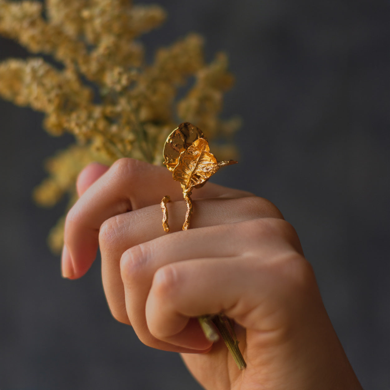 Bougainvillea Veranera Ring in 24k Gold showcasing its natural elegance and vibrant flower design.