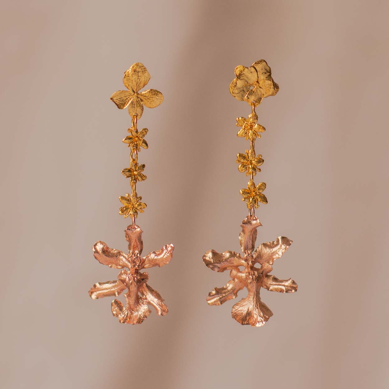 Gold-plated Sharry Baby Orchid, Hydrangea & Elderflower Earrings capturing the unique elegance of each flower.