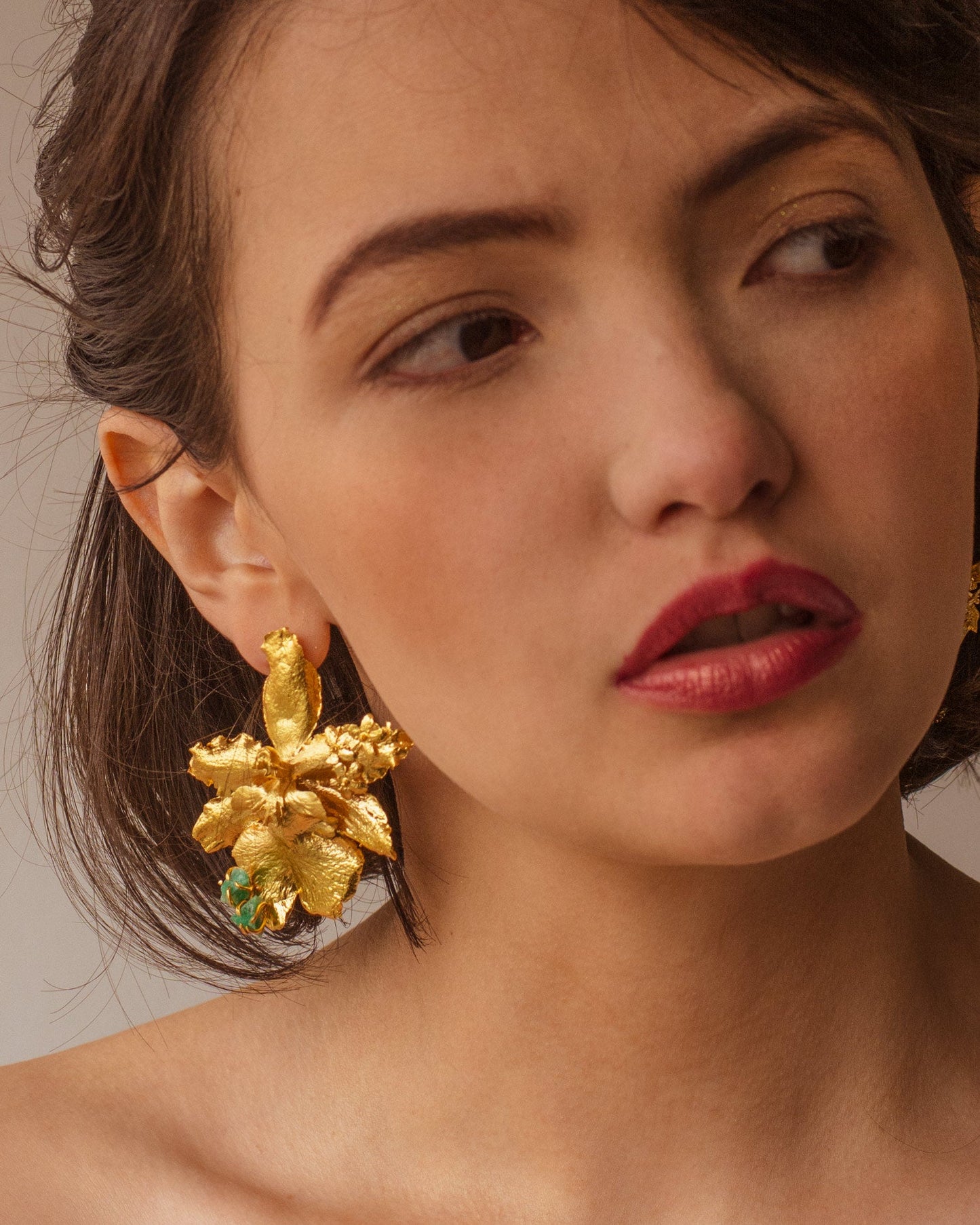 Exquisite Odontoglossum Orchid Emerald Elderberry Earrings in 24k Gold Plating, a reflection of nature's eternal beauty and harmony
