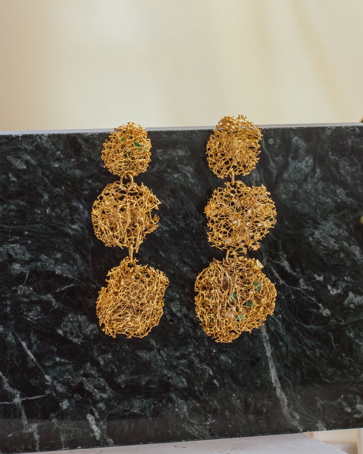 Elegant Three Luffa & Emerald Large Earrings in 24K gold plating, featuring raw Colombian emerald chips for a unique statement of beauty and sustainability