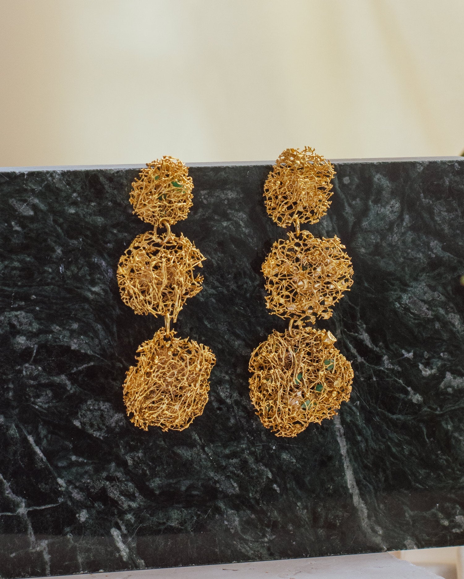 Elegant Three Luffa & Emerald Large Earrings in 24K gold plating, featuring raw Colombian emerald chips for a unique statement of beauty and sustainability