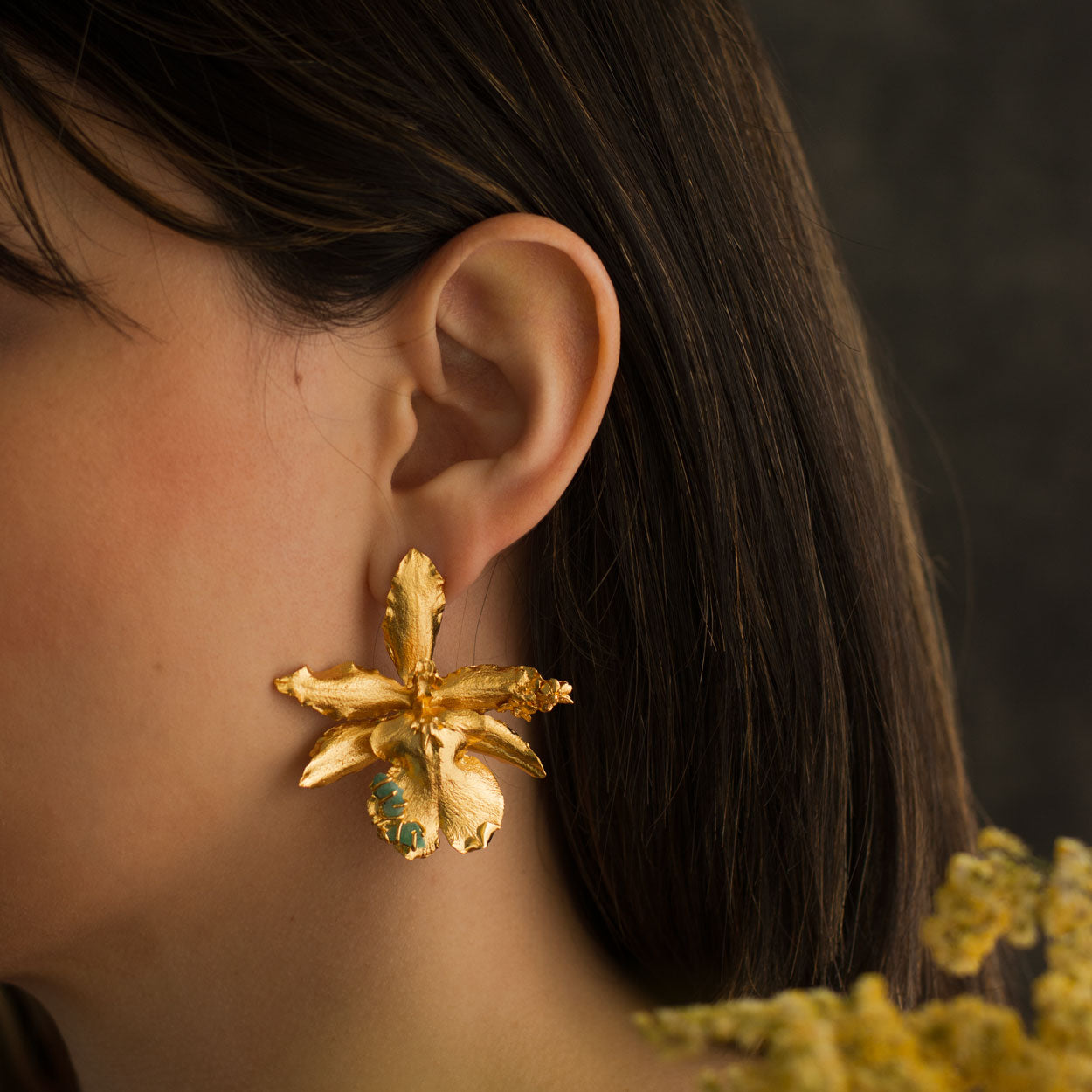 Exquisite Odontoglossum Orchid Emerald Elderberry Earrings in 24k Gold Plating, a reflection of nature's eternal beauty and harmony