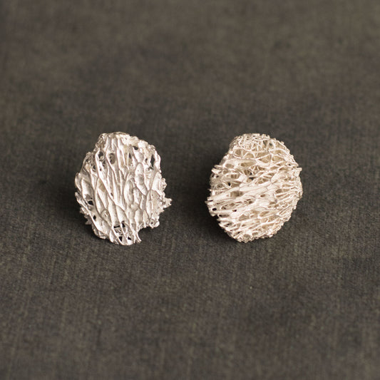 Luffa Scrub Silver Stud Earrings crafted from natural fibers and eco-friendly silver, showcasing sustainable elegance.