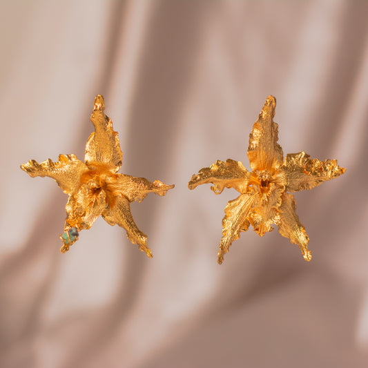 Luxurious Crispum Orchid Elderflower Emerald Earrings in 24K gold plating, adorned with Colombian emerald chips, symbolizing wisdom and abundance