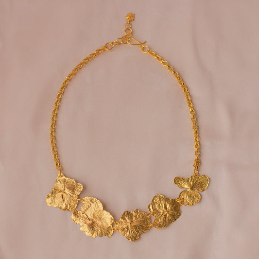 Large Hydrangea Necklace, featuring preserved hydrangea flowers and 24k gold finish.
