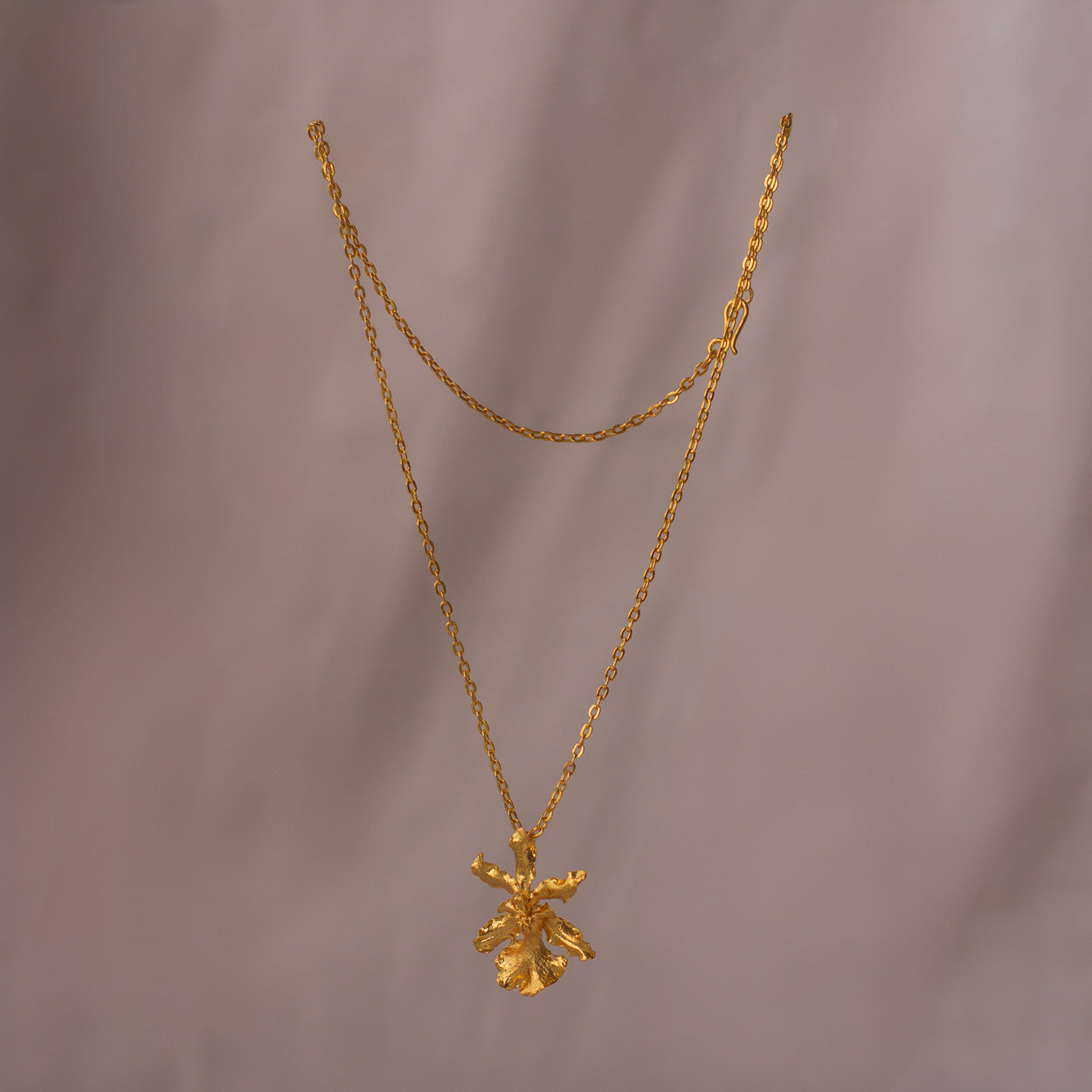 Oncidium Sharry Baby Orchid Necklace, handcrafted with a preserved orchid flower and 24k gold finish