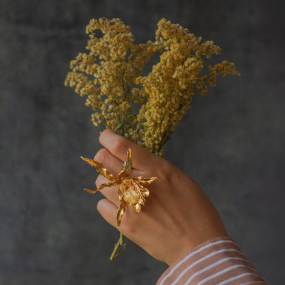 Unique sustainable jewelry: Brassia Orchid Emerald Ring with organic materials and 24k gold plating