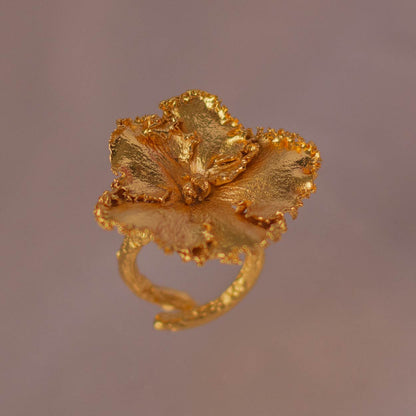 Ornamental Flower Ring in bronze with 24k gold, showcasing a unique, nature-inspired design.