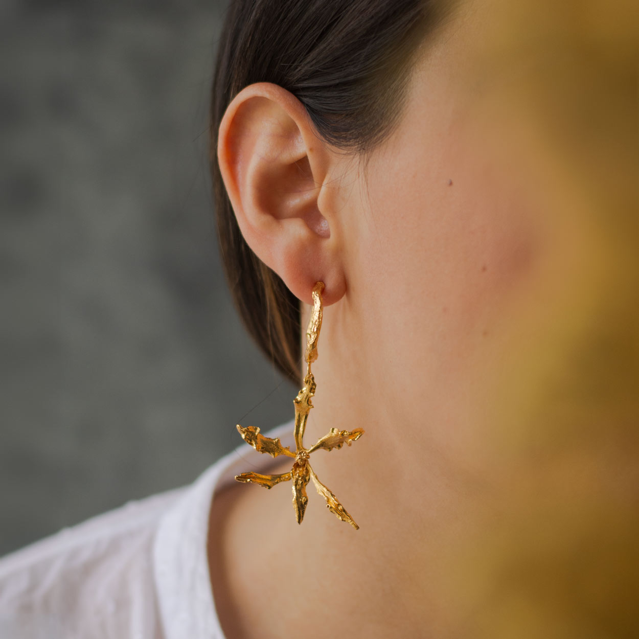 Unique Cyrtochilum Revolutum orchid earrings, gold-plated hoops perfect for adding a touch of exotic nature to any outfit