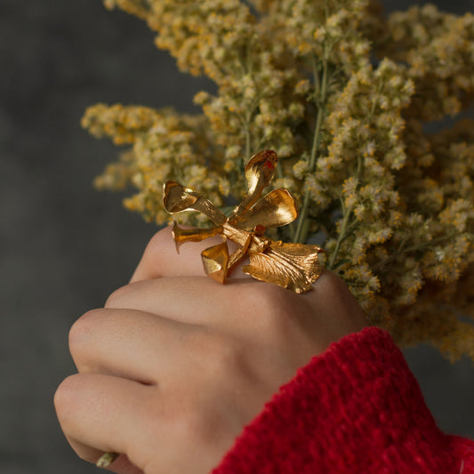 Model wearing Encyclia Cordigera Orchid Ring, illustrating its unique botanical beauty and exclusivity.
