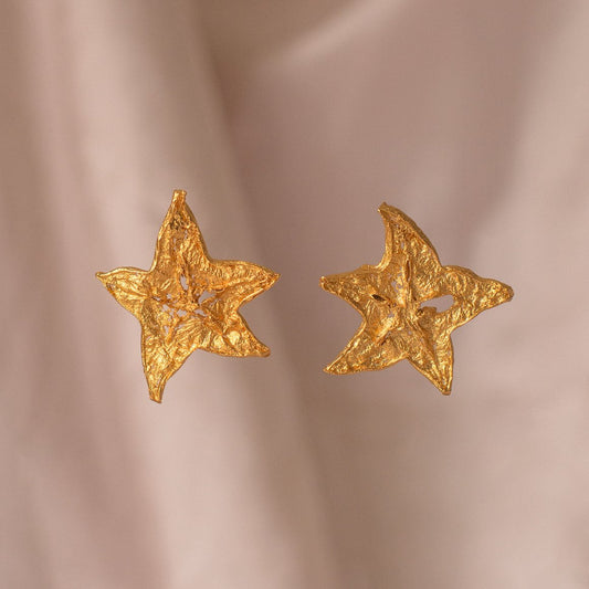 Starfruit Slice Stud Earrings featuring natural starfruit shape and 24k gold plating.
