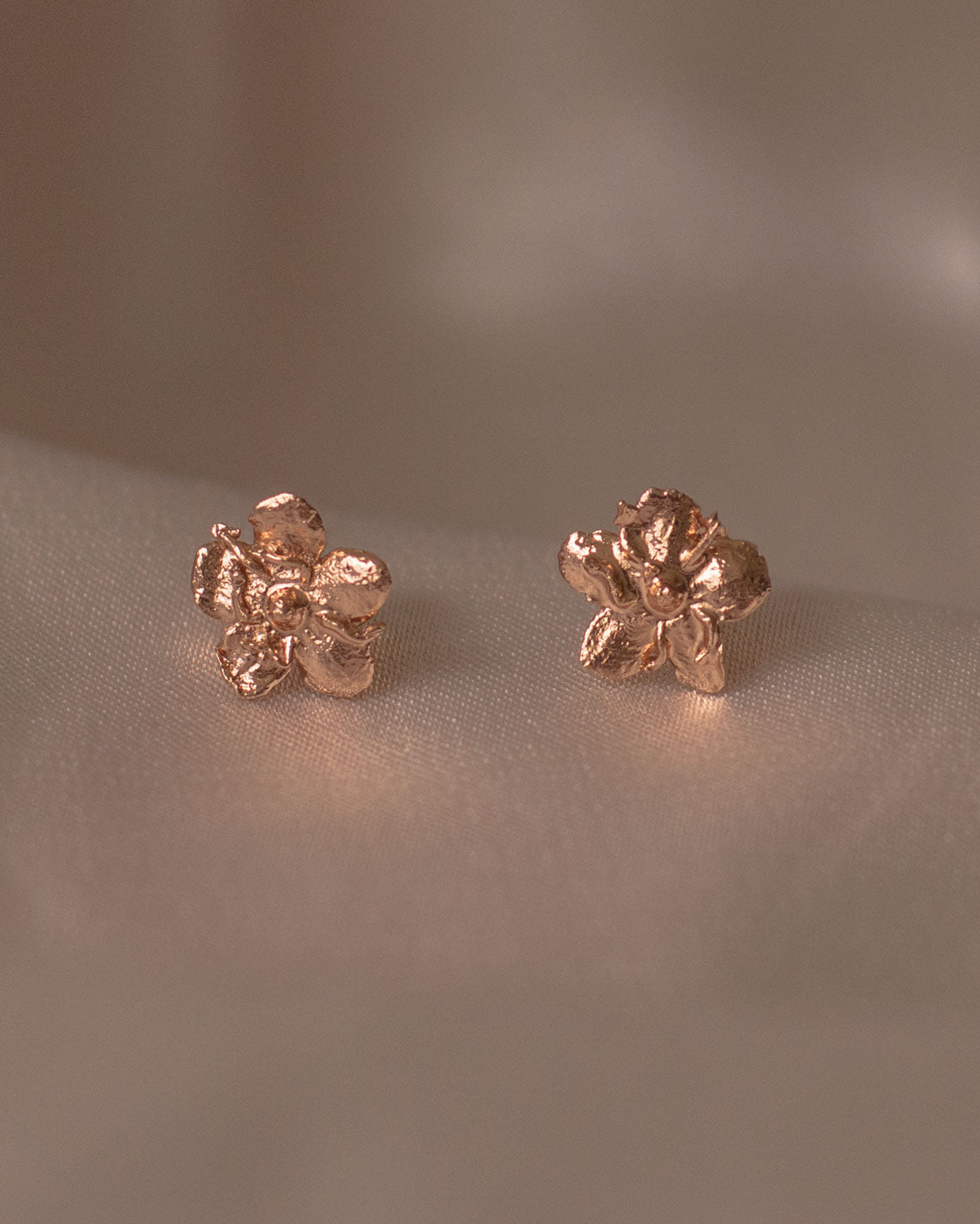 Elegant Mini Elderflower Stud Earrings in 24K gold plating, capturing the delicate essence of nature in a luxurious accessory