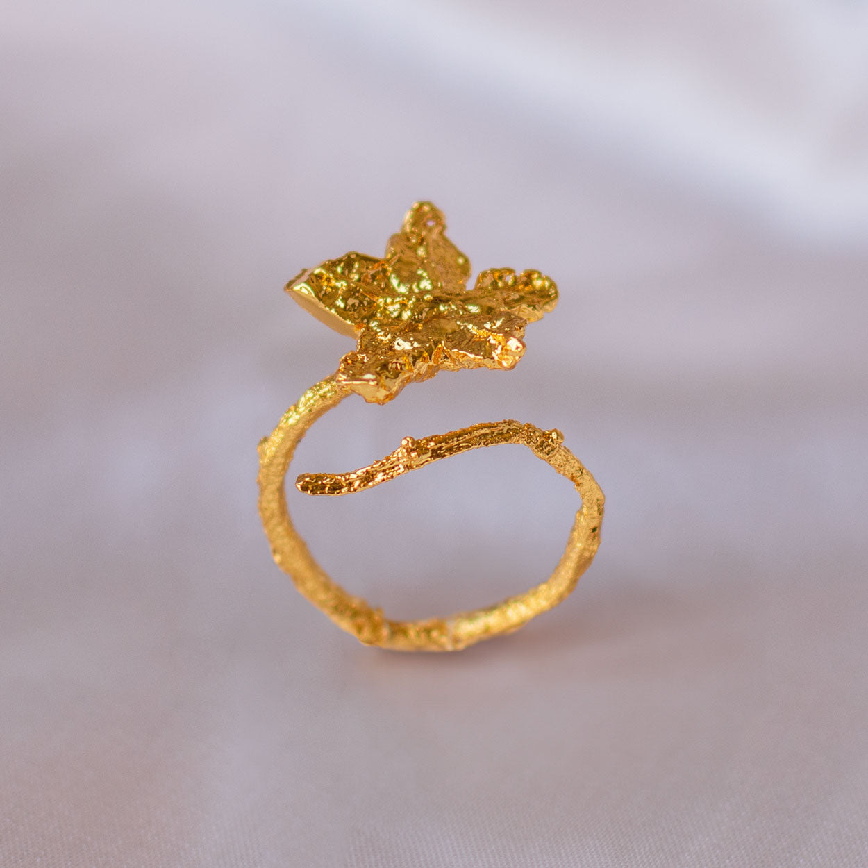 Luxurious Carambolo Star Ring in 24K gold plating, a unique cosmic piece capturing the tropical essence