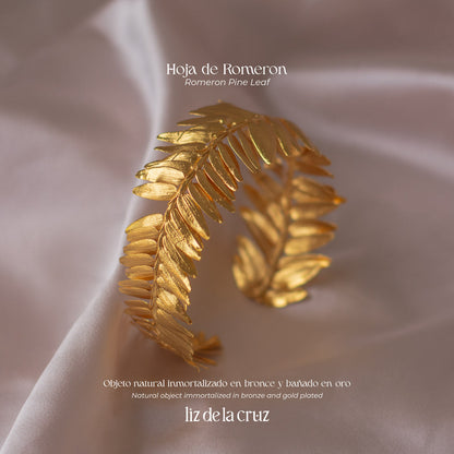 Elegant Roseron Pine Leaf Fern Bracelet in 24K gold plating, capturing the serene beauty of the forest in a luxurious design