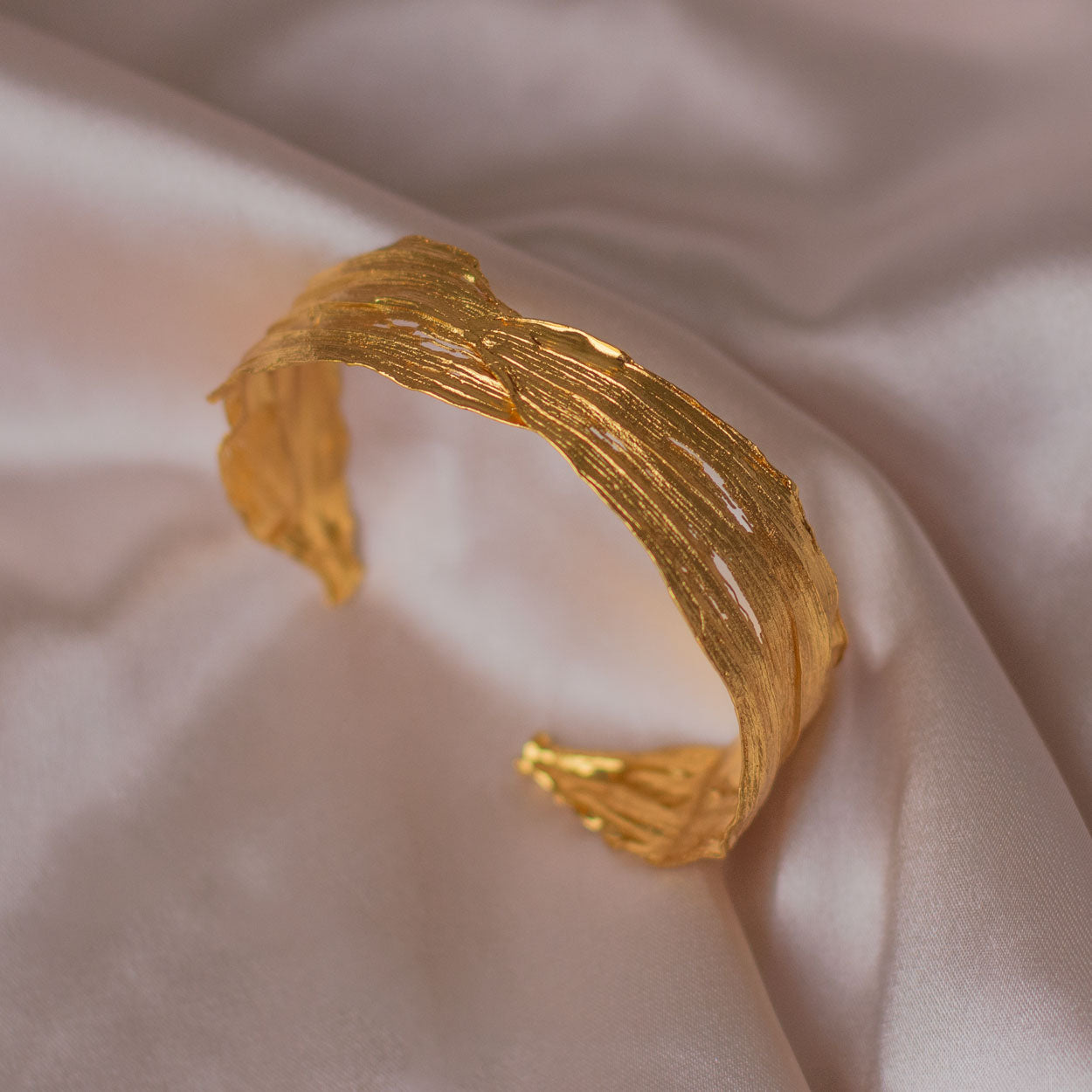 Elegant Cattleya Orchid Leaf Bracelet in 24K gold plating, celebrating the uniqueness of nature and sustainable fashion