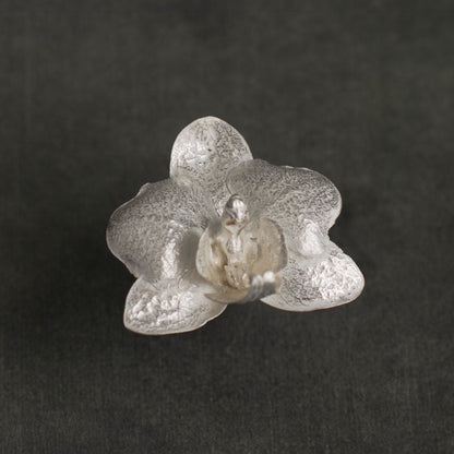 Elegant Phalaenopsis Orchid Ring in sustainable silver, capturing the essence of ecological awareness and design