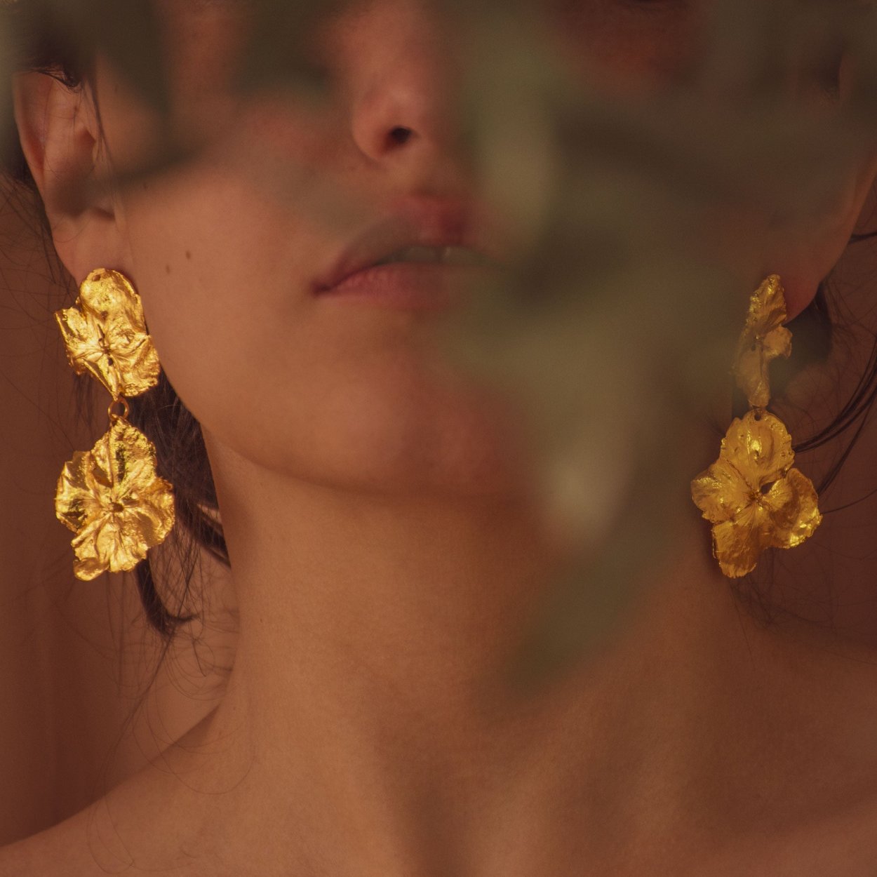 Model wearing Two Hydrangea Earrings, highlighting the natural beauty and unique design.
