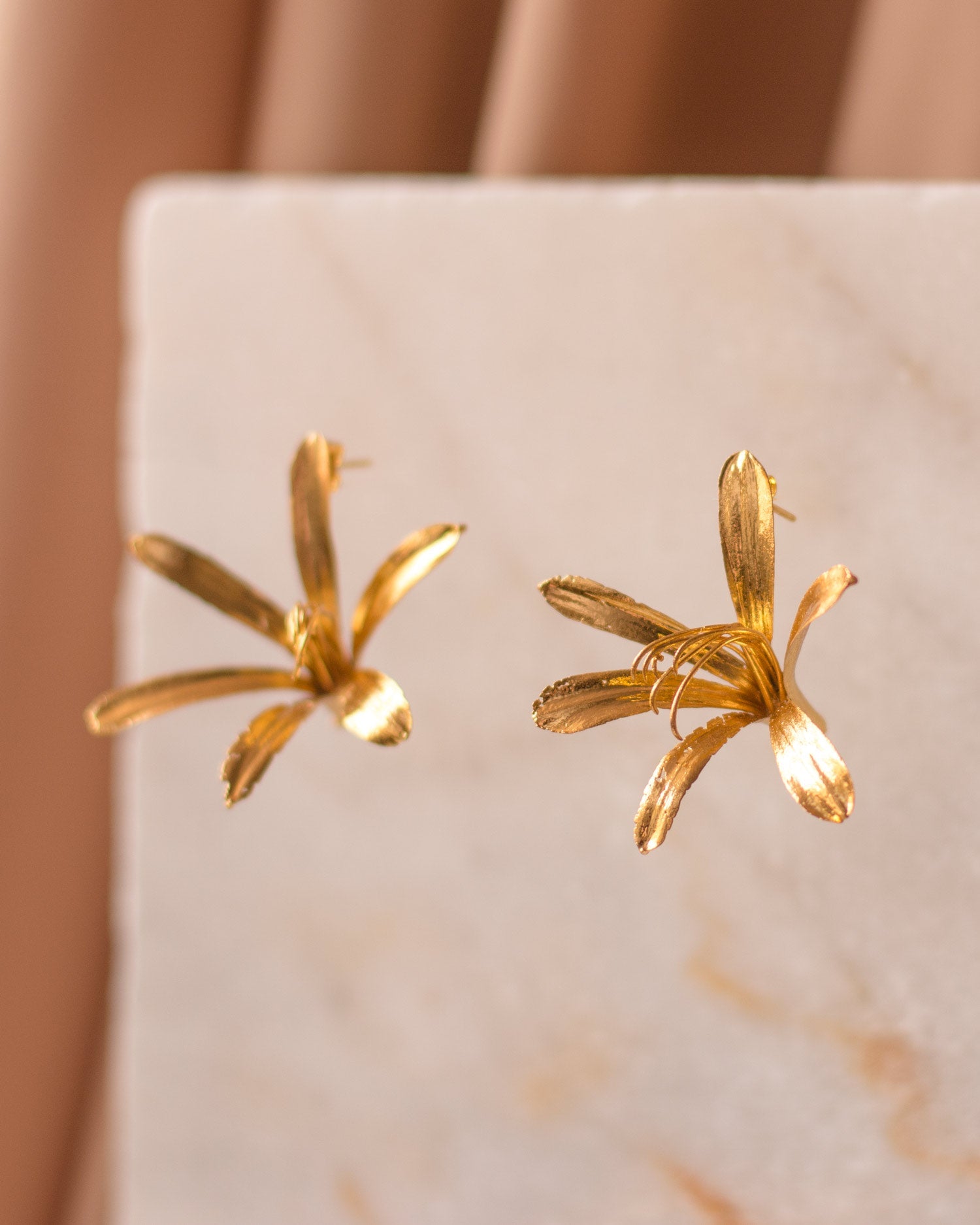 Elegant Agapanthus Lily Stud Earrings plated in 24K gold, capturing the grace of natural beauty in a sophisticated design