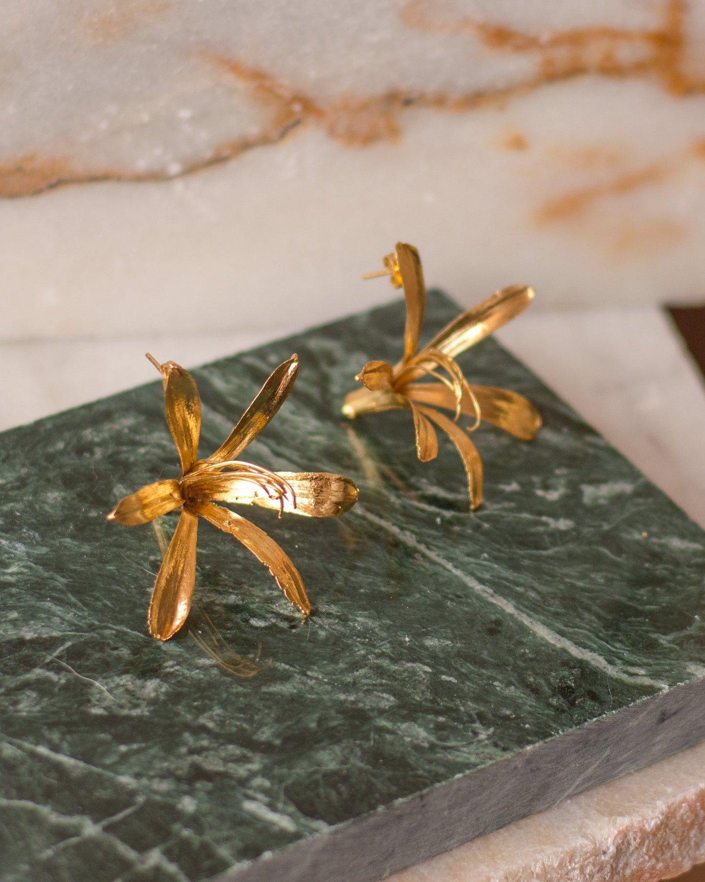 Elegant Agapanthus Lily Stud Earrings plated in 24K gold, capturing the grace of natural beauty in a sophisticated design