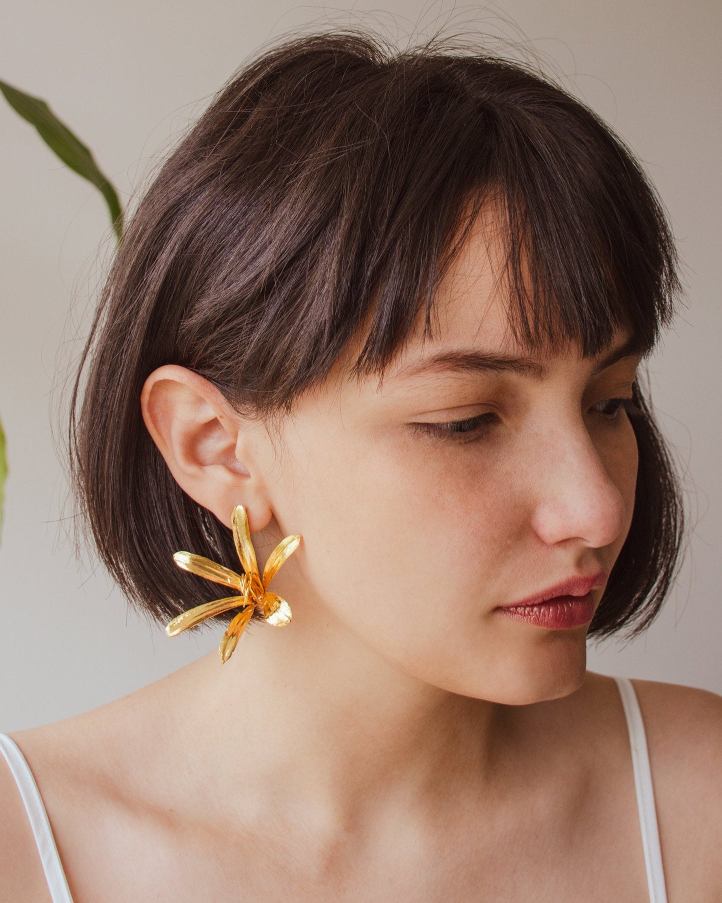 Elegant Agapanthus Lily Stud Earrings plated in 24K gold, capturing the grace of natural beauty in a sophisticated design