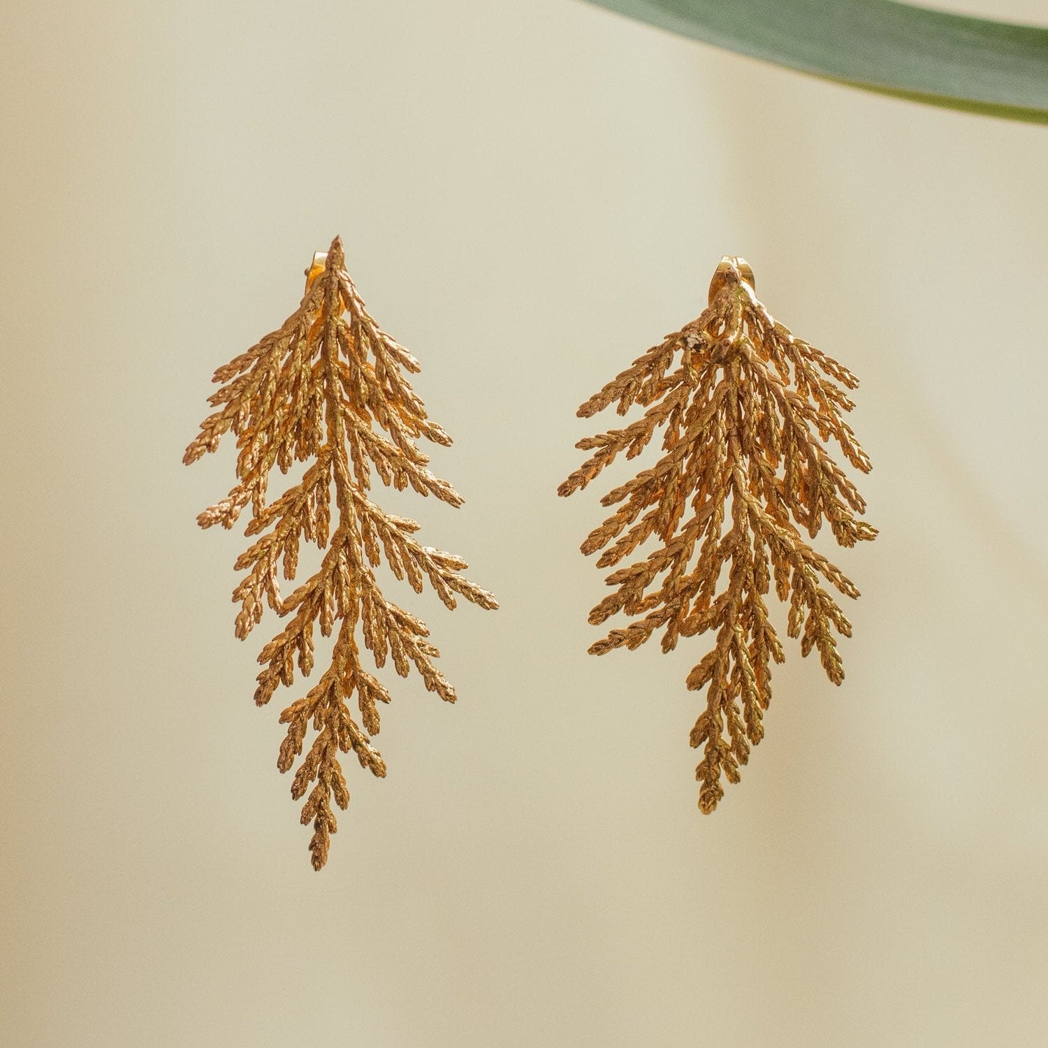 Large Pine Leaf Earrings handcrafted with organic casting technique and 24k gold plating