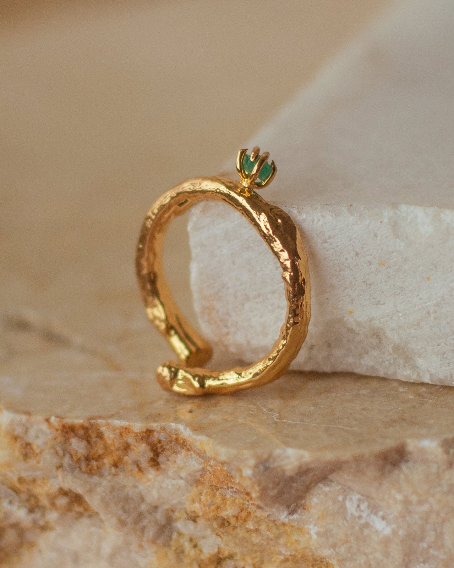 Elegant Twig Ring with Colombian Raw Emerald in 24K gold plating, a unique artisanal piece that captures the spirit of nature and the luxury of precious stones