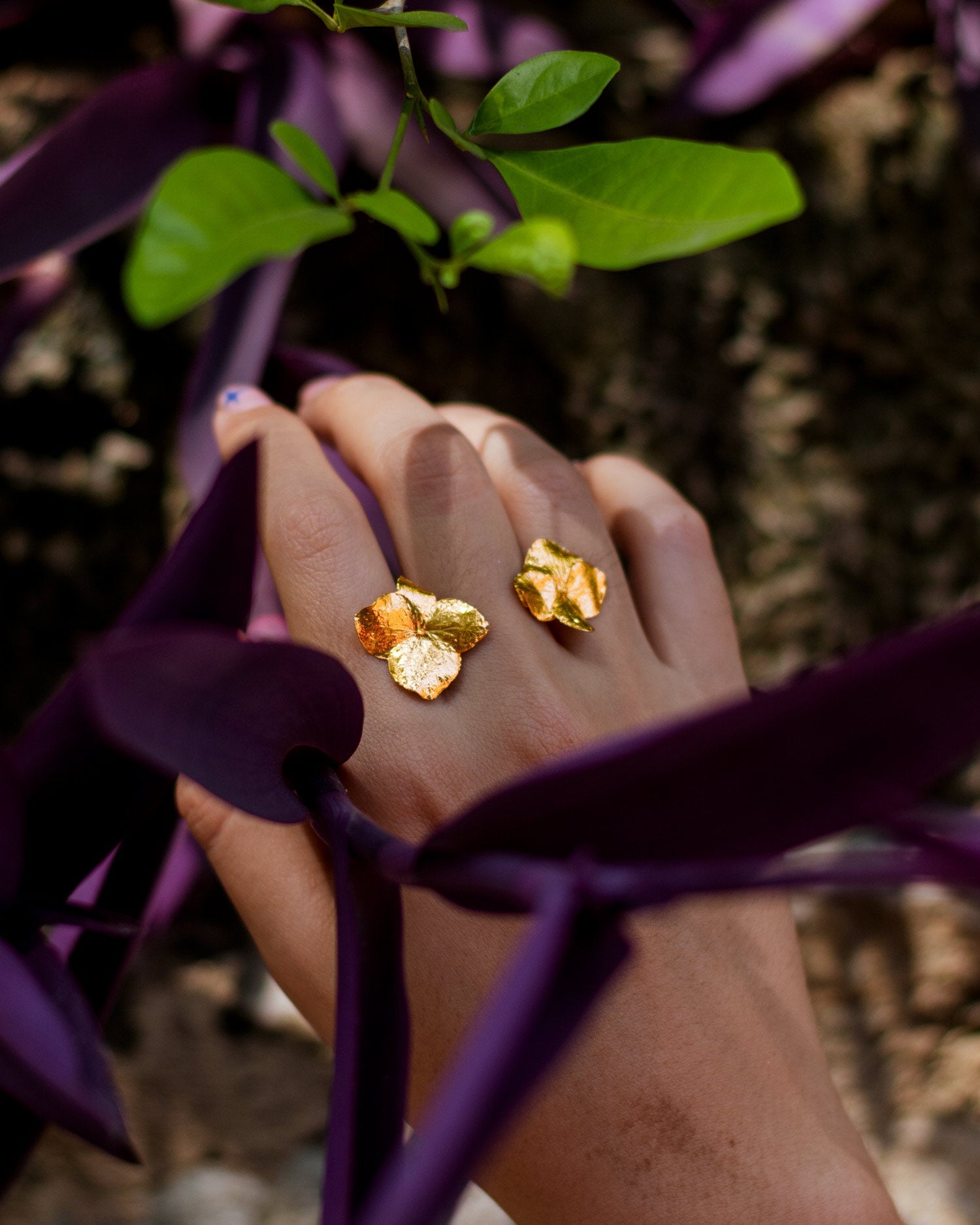 Elegant Dual Hydrangea Ring in 24K gold plating, capturing the unique beauty and dedication to nature in a luxurious design