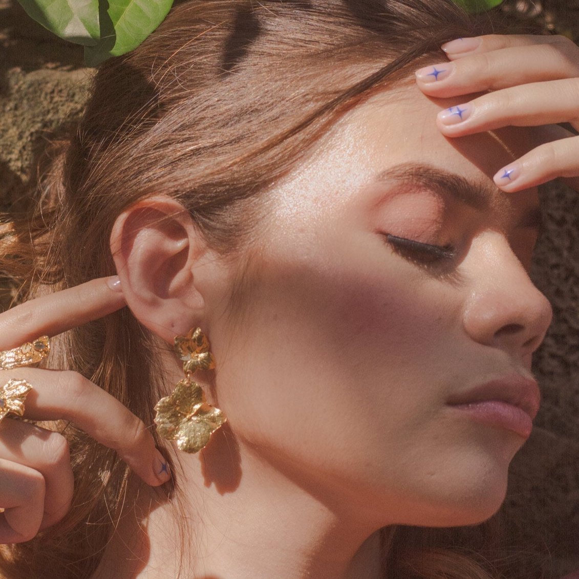 Model wearing Two Hydrangea Earrings, highlighting the natural beauty and unique design.
