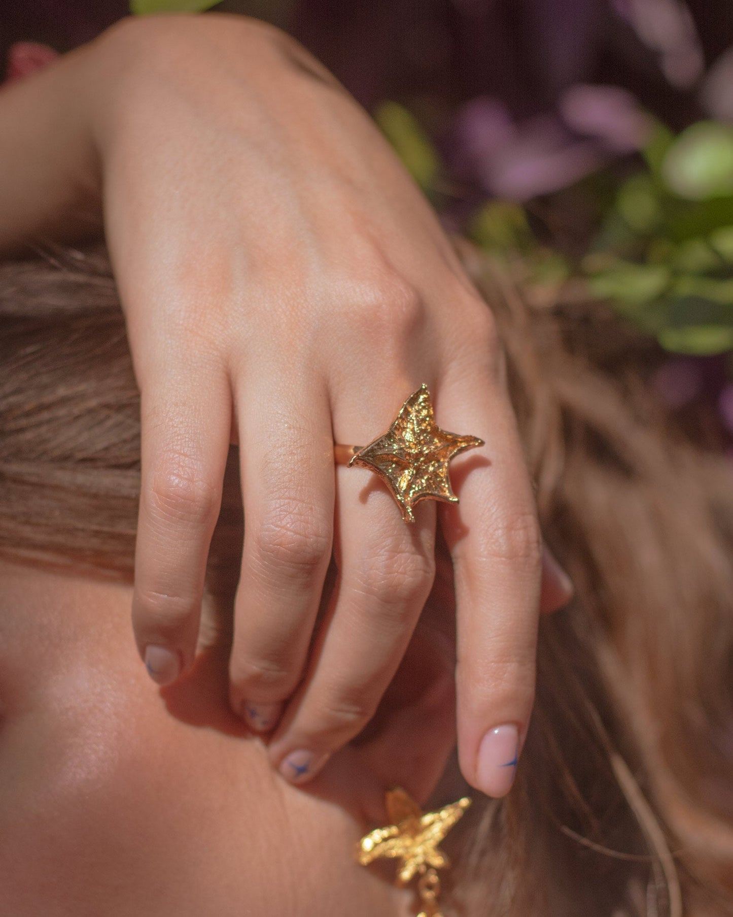 Luxurious Carambolo Star Ring in 24K gold plating, a unique cosmic piece capturing the tropical essence