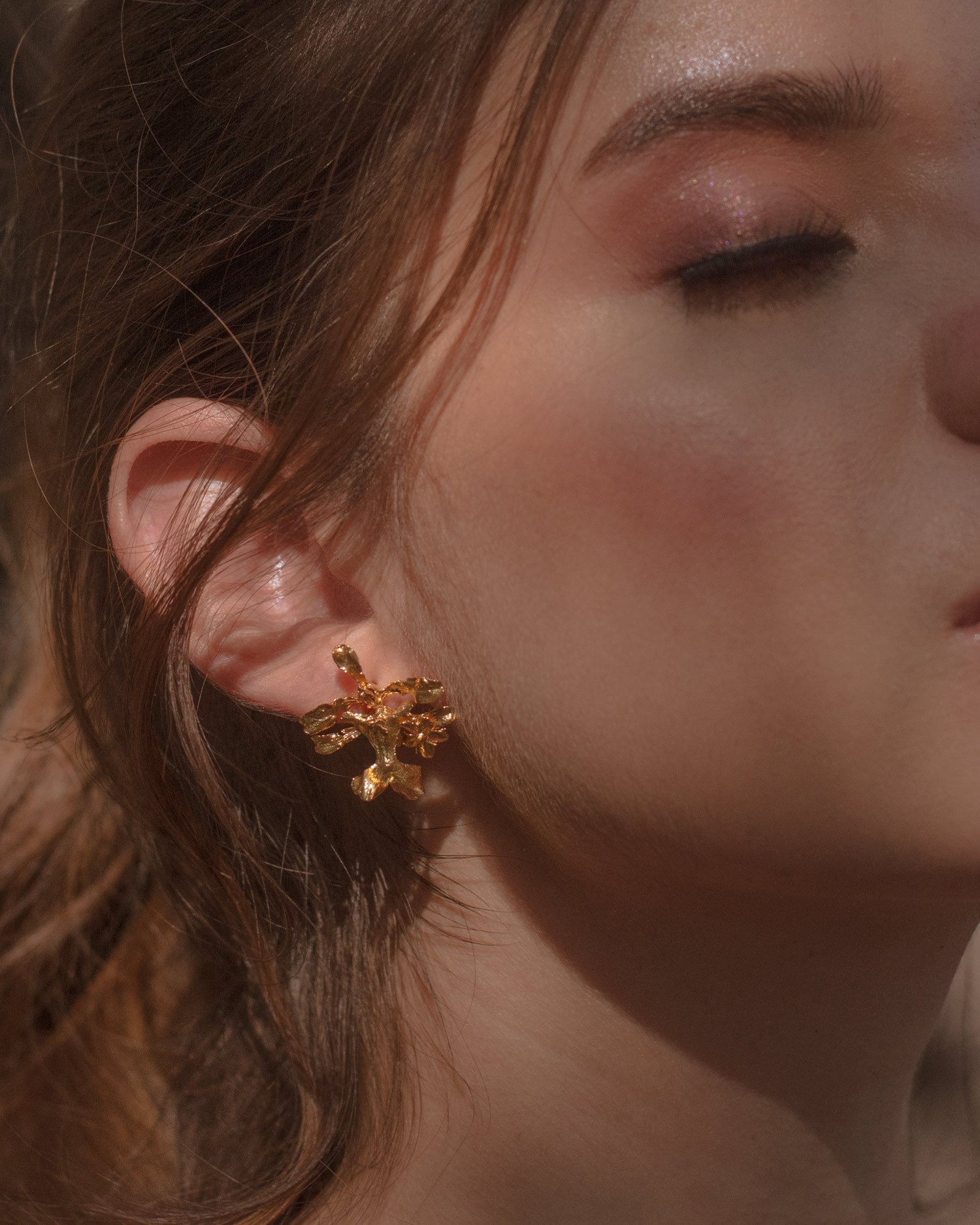 Elegant Oncidium Orchid Stud Earrings plated in 24k gold, showcasing the unique beauty of nature.