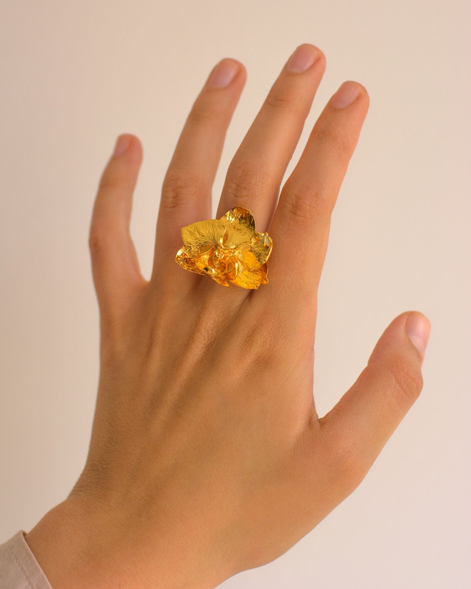 Exquisite Emerald Phalaenopsis Orchid Gold Ring, a unique piece that brings nature's essence into an elegant design