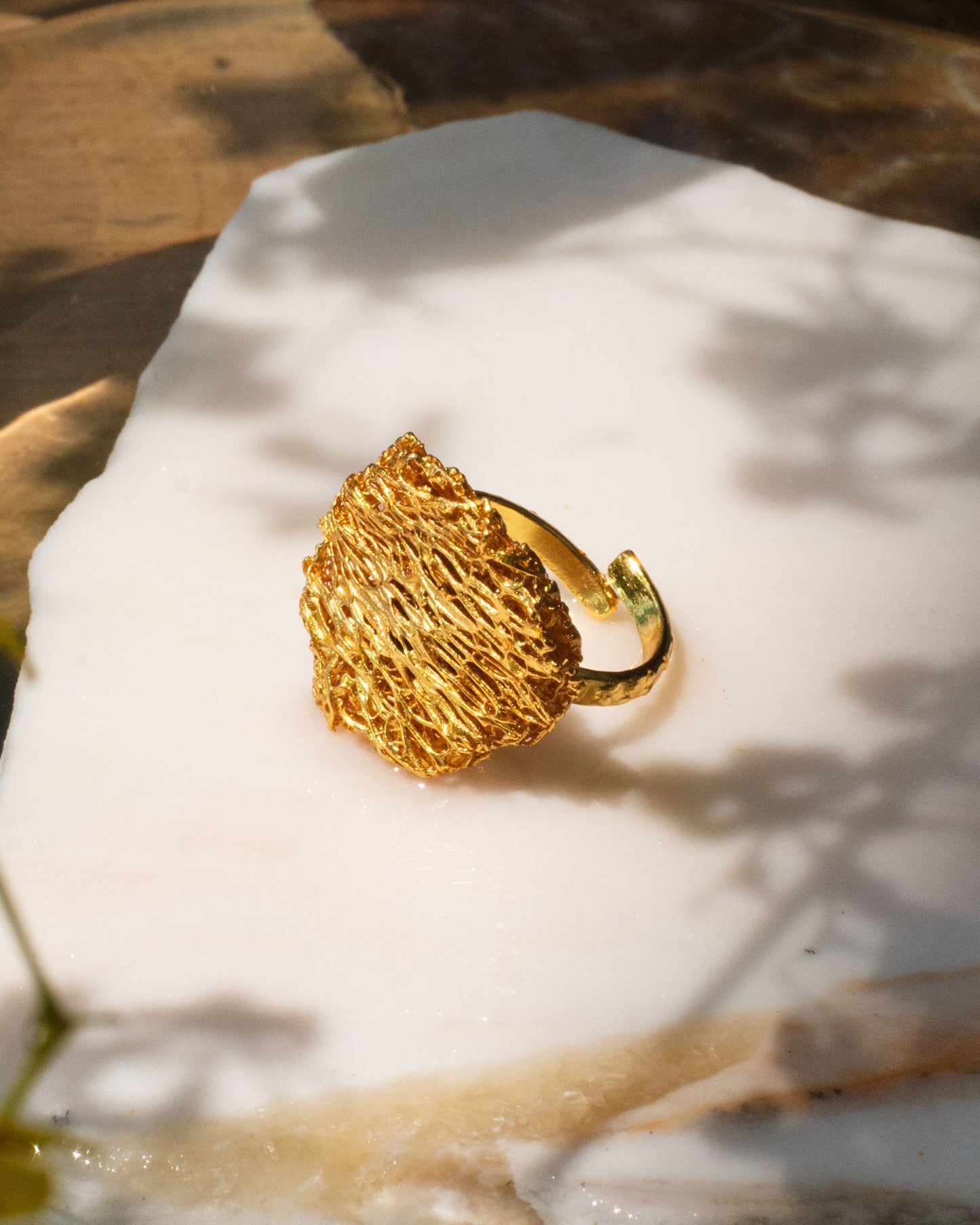 Unique Round Luffa Sponge Ring, made from bronze and plated with 24k gold, showcasing the organic texture of luffa