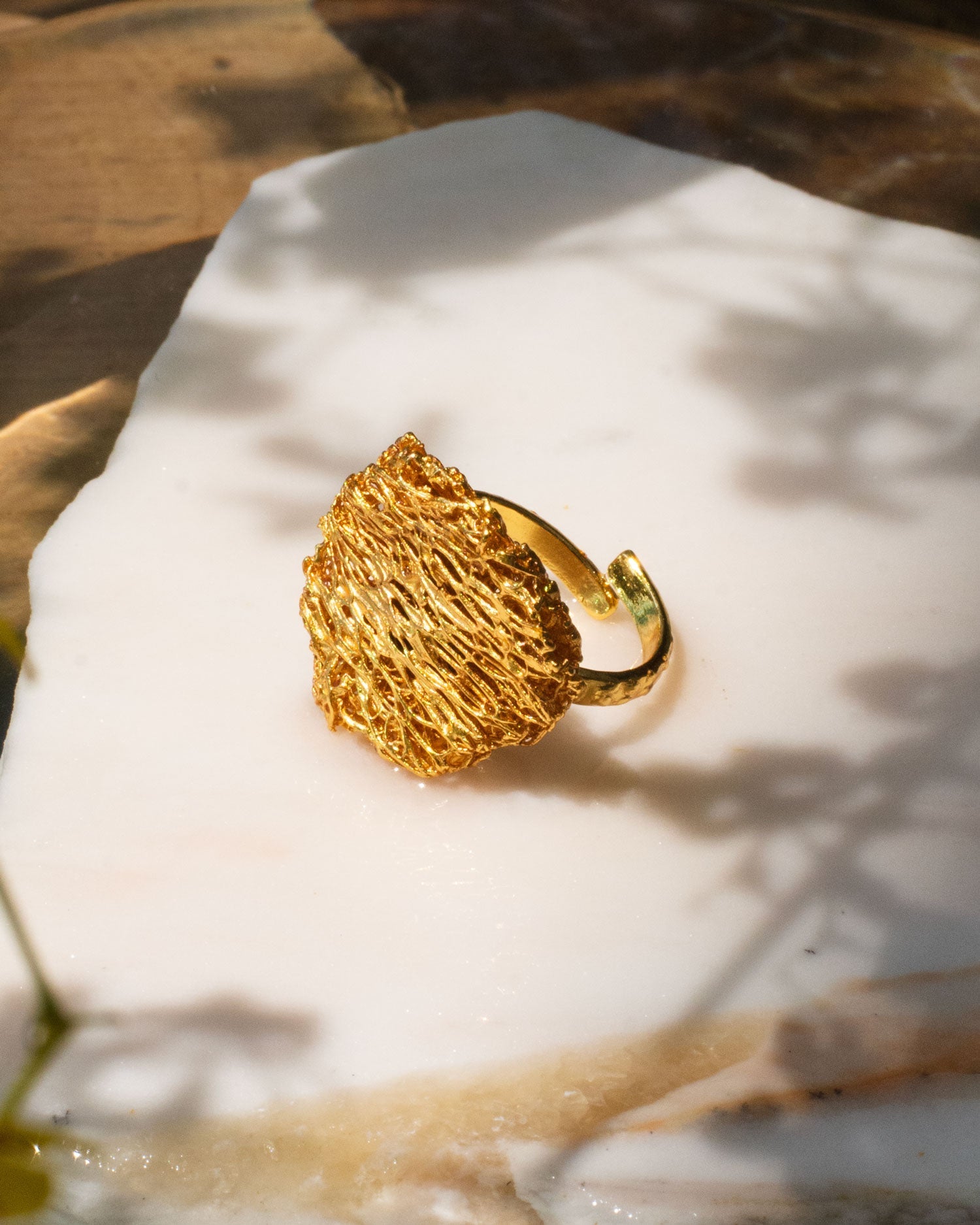 Unique Round Luffa Sponge Ring, made from bronze and plated with 24k gold, showcasing the organic texture of luffa