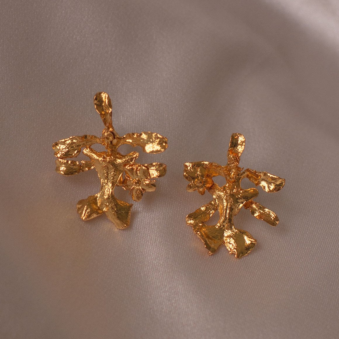 Elegant Oncidium Orchid Stud Earrings plated in 24k gold, showcasing the unique beauty of nature.