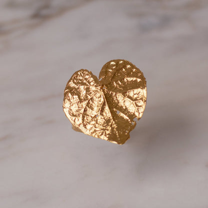 Close-up of Heart Leaf Ring showcasing the intricate details of the heart-shaped ivy leaf preserved in bronze and plated with 24k gold