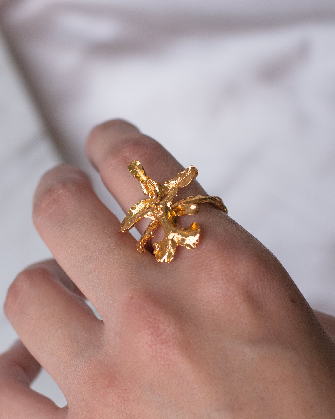 Elegant Oncidium Orchid Ring plated in 24K gold, symbolizing the vitality and exuberance of nature.