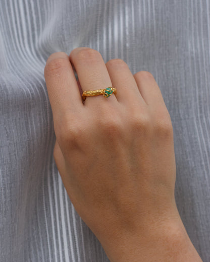 Elegant Twig Ring with Colombian Raw Emerald in 24K gold plating, a unique artisanal piece that captures the spirit of nature and the luxury of precious stones