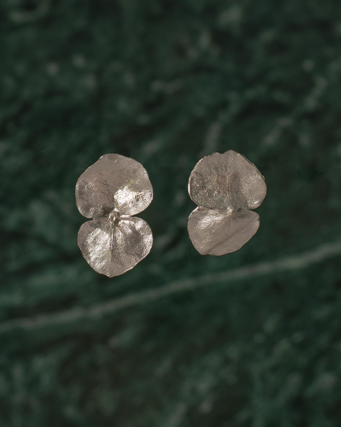 Elegant Eco-Friendly Silver Eucalyptus Stud Earrings, a celebration of natural beauty and environmental care